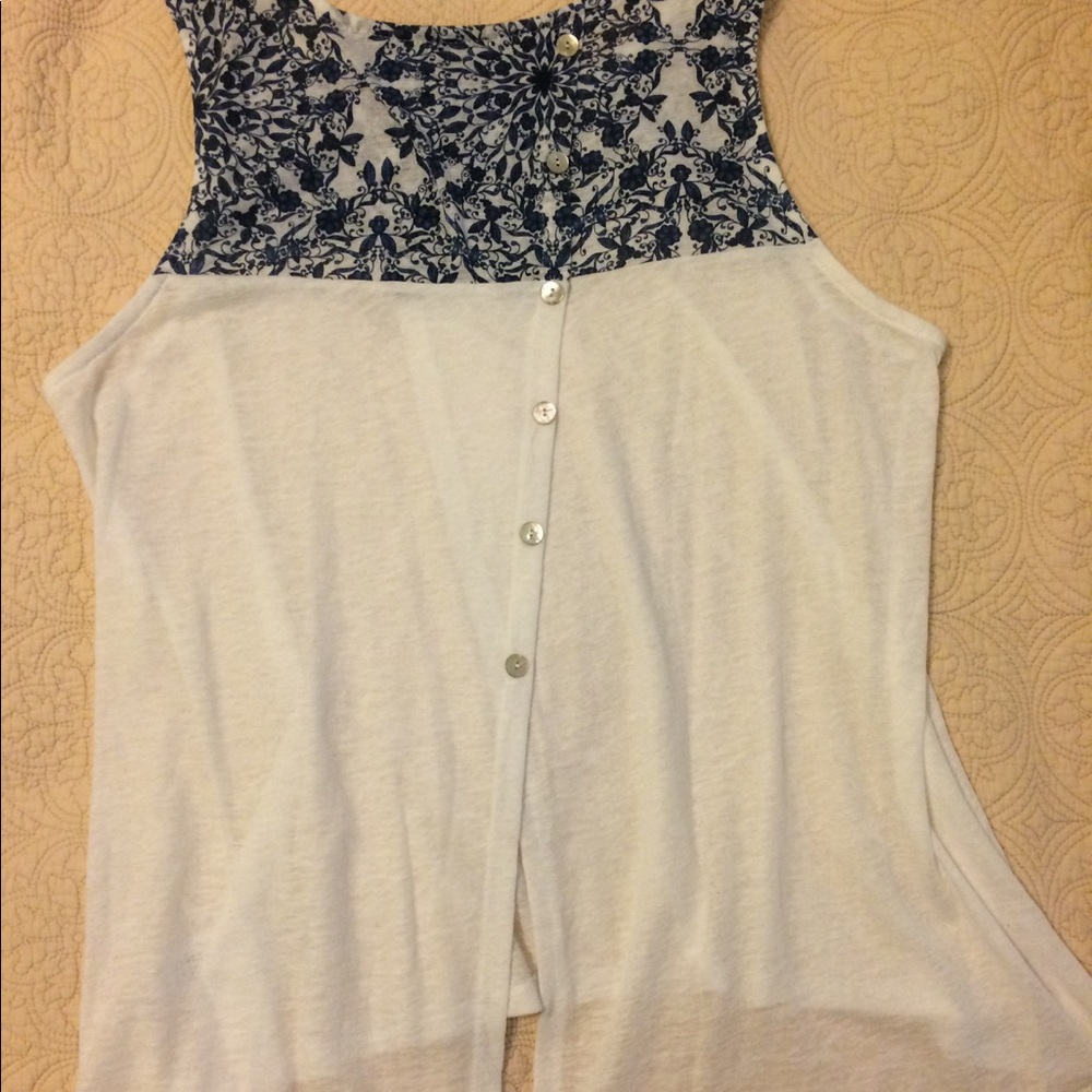 Hi-low button-back tank